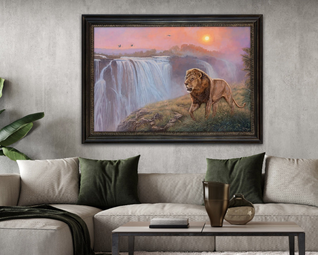 Framed artwork of a lion and waterfall in a living room setting
