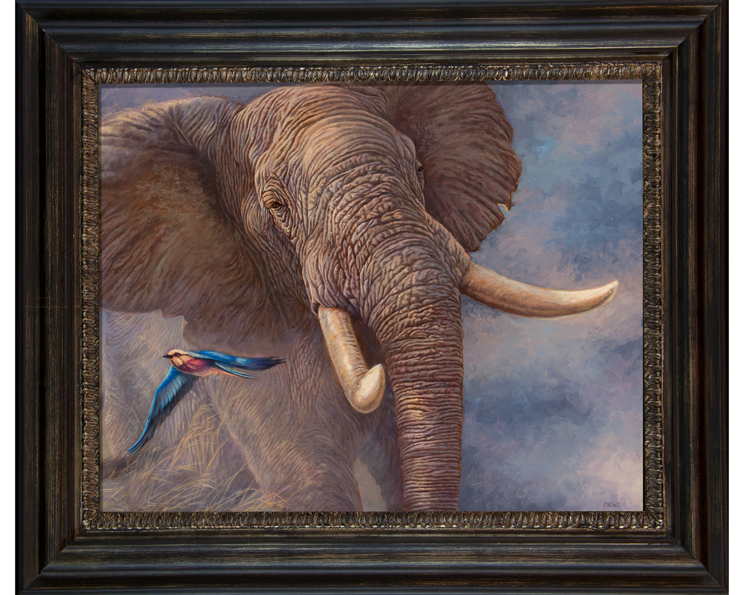 Framed painting of an elephant against a cloudy sky.