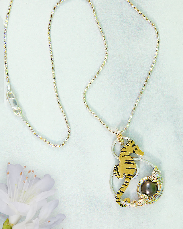 Ocean's Whisper: Tahitian Pearl Seahorse Necklace