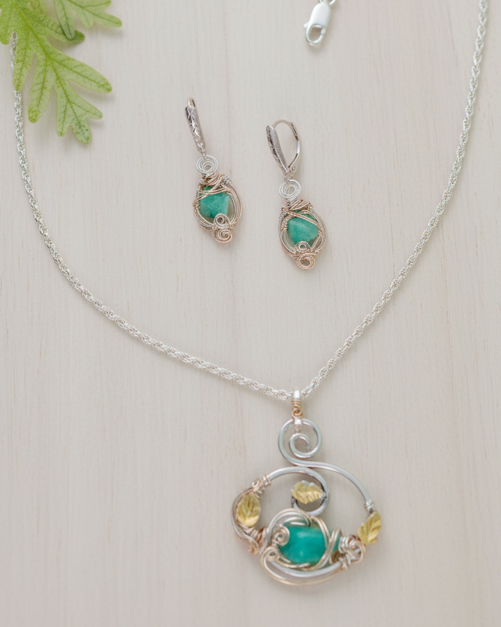 Silver jewelry set with turquoise stones on a white background